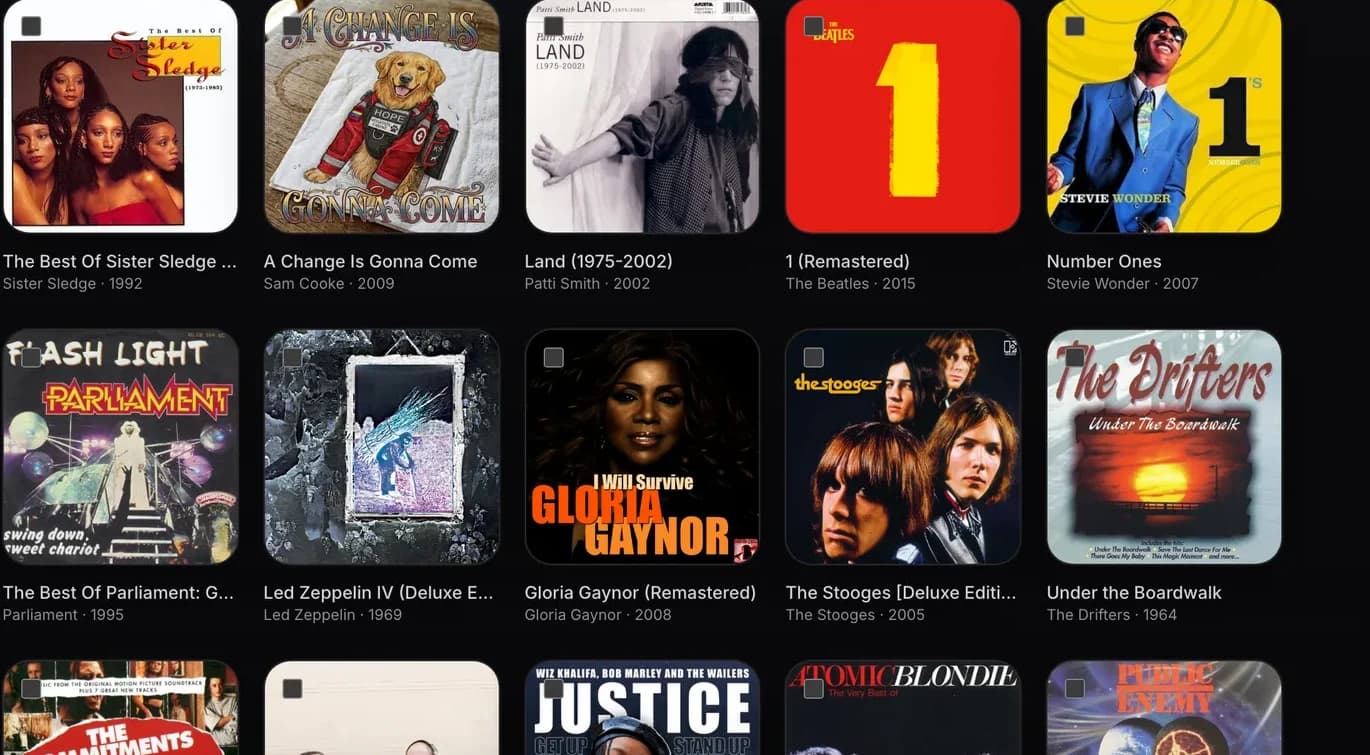 The OriginPlayer web library showing a grid of album artwork from a personal collection