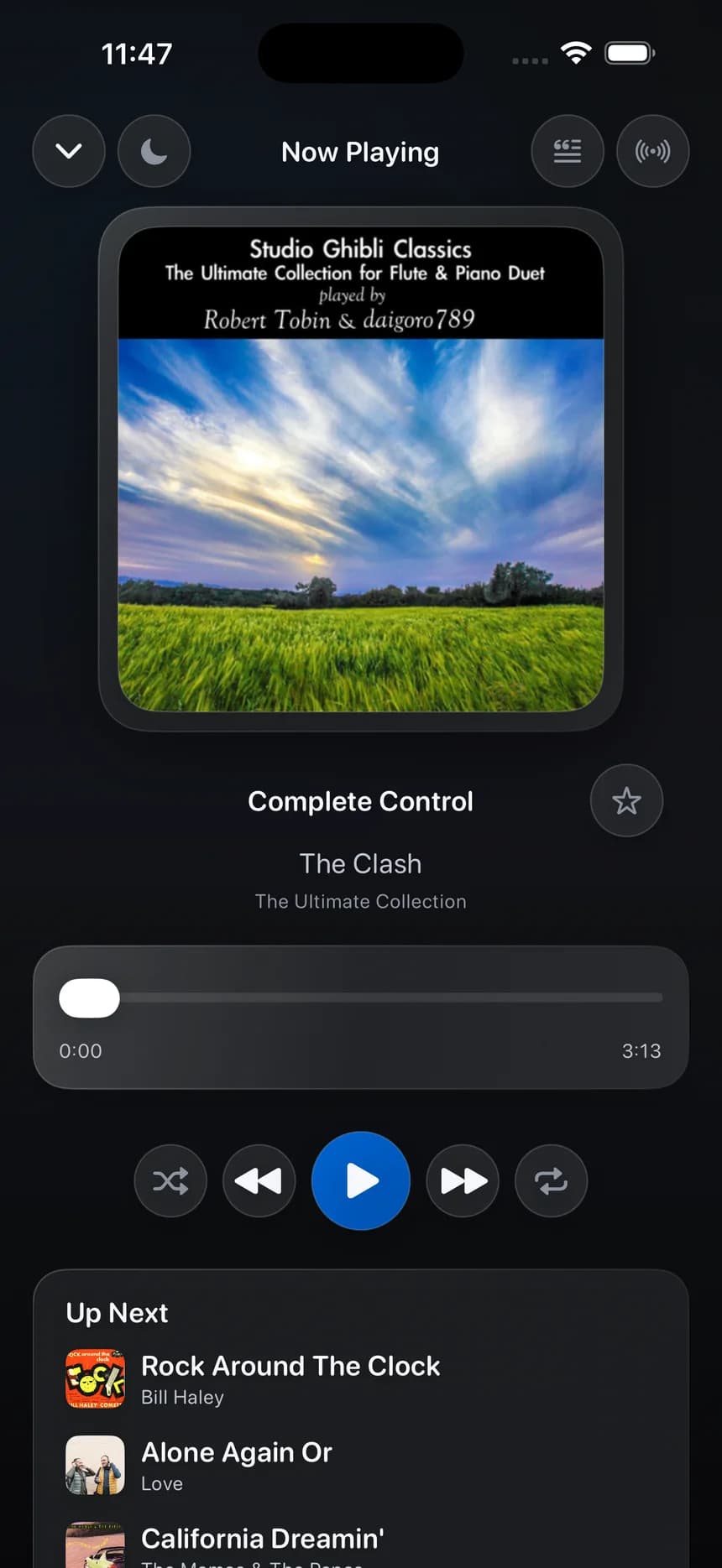 The OriginPlayer iPhone now playing screen with artwork and playback controls